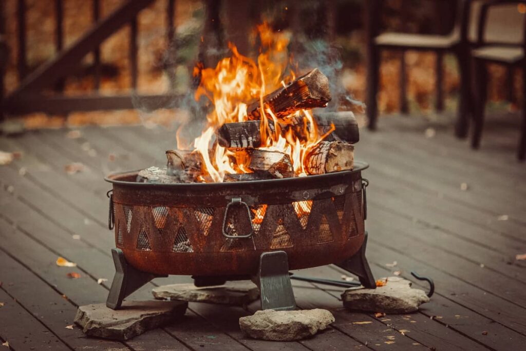 a photo of a firepit with a smokey campfire
